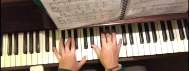 Tara's hands playing piano