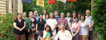 Some of our friendly members under the Dhammachakra flags in our garden
