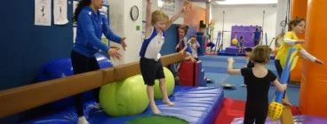 Kindergym class on the beam