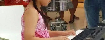 One of our student performing in the Werrbee Plaza