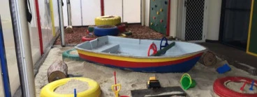 This is one of our play areas including a large sandpit with play boat, climbing tyres and an area for the children to ride bikes and do other activities