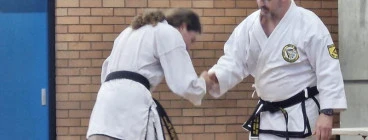 Master Troy Presenting Fist dan Black Belt