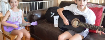Alice and Gabriel practicing 'Somewhere Over the Rainbow' together!