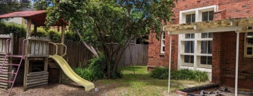 Fabulous outdoor play area with tree cover