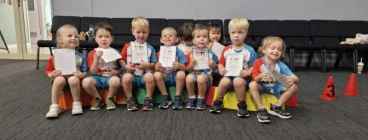 Proud kids with their end of term certificates