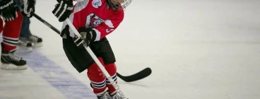 Juniors playing ice hockey.