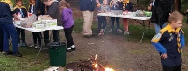 Scouts can experience outdoor activities like camping.