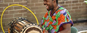 Master Drummer Tuza comes alive in front of an audience