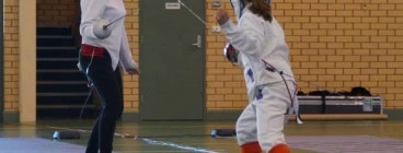 Junior epeeists in competition