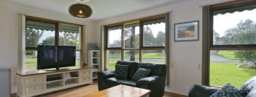 Air-conditioned lounge, big screen TV, DVDs, comfortable leather couches