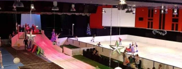 Ice skating with a huge tobogganing slide.