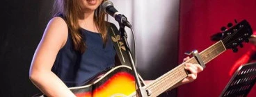 Young guitar and vocal student Elavina Williams