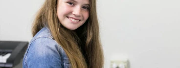 Cassandra in her keyboard lesson at Do Re Mi Studios.