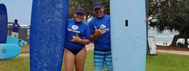 Surfing is great fun to share with a friend!