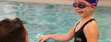 One of our young students listening to her instructor.