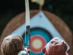Kids Learing Archery