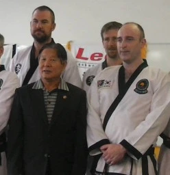 Black belts with Master Lee