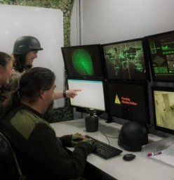 Aliens have arrived and they want to do more than just phone home. You are a special forces team sent in to restore our defences, can you get our missiles online and stop the alien invasion?
