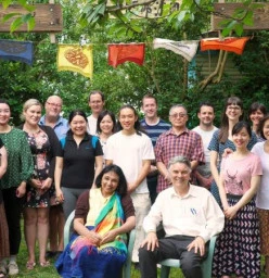 Some of our friendly members under the Dhammachakra flags in our garden