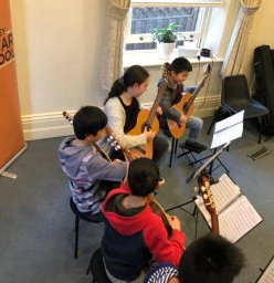 Guitar lessons and ensemble classes for kids.