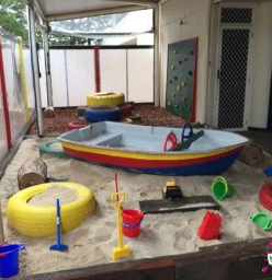 This is one of our play areas including a large sandpit with play boat, climbing tyres and an area for the children to ride bikes and do other activities