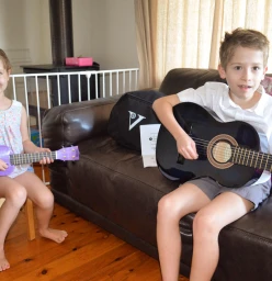Alice and Gabriel practicing 'Somewhere Over the Rainbow' together!