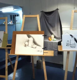 Charcoal drawing in the gallery