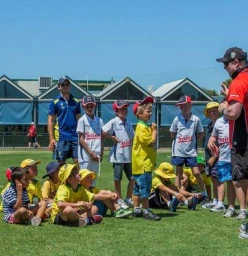 Some of our junior cricketers having a training session with the Melbourne Renegades.
