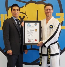5th Dan awarded to Mr Evan Pritchard by Senior Master Andrew RHEE
