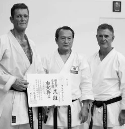 Alan Armitage Sempai with Seiichi Fujiwara Hanshi 8th Dan Gojuryu Karate do Seiwakai and Glenn Stephenson Shihan 6th Dan Gojuryu Karate do Seiwakai with his 2nd Dan Certificate from Japan