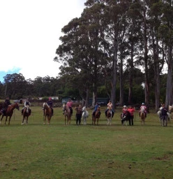 School holiday camp group ride on our hill