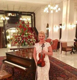 Performing in Singapore by invitation for National Day at Iconic Raffles Hotel