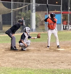 Catcher ready to receive, batter ready