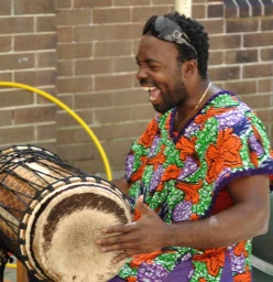 Master Drummer Tuza comes alive in front of an audience