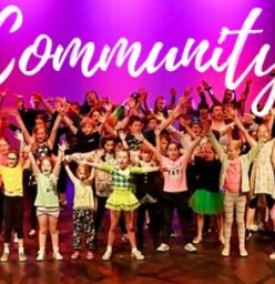 Students performing on stage 2019