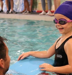 One of our young students listening to her instructor.
